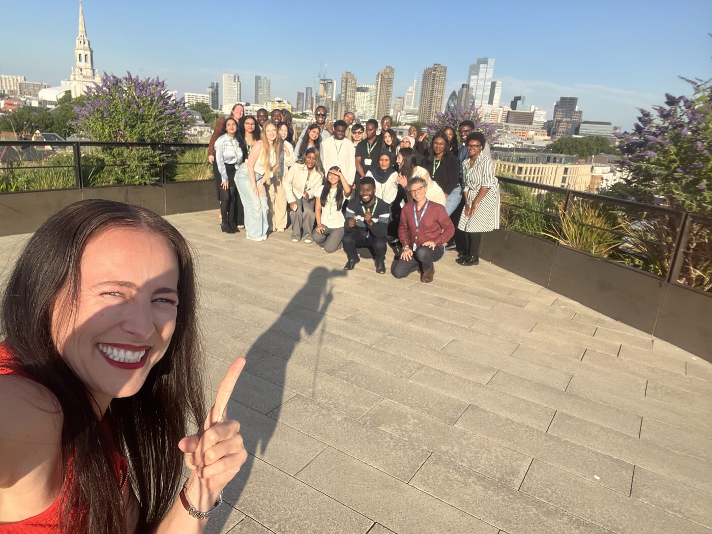 Lisa Goodchild with a group of young people on a London rooftop at a Digilearning event